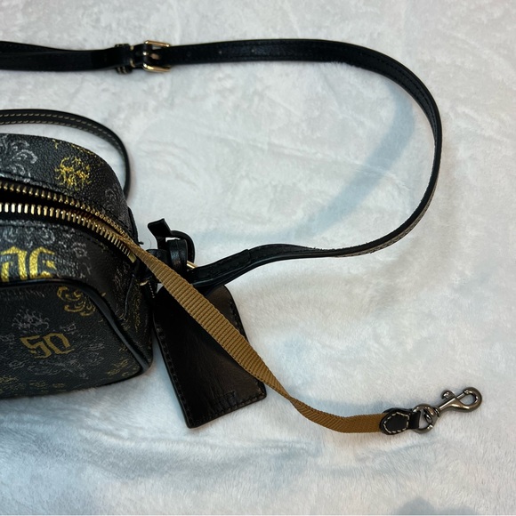 Dooney & Bourke Disney Park
Haunted Mansion 50th
Anniversary Bag Crossbody Purse - Picture 6 of 16